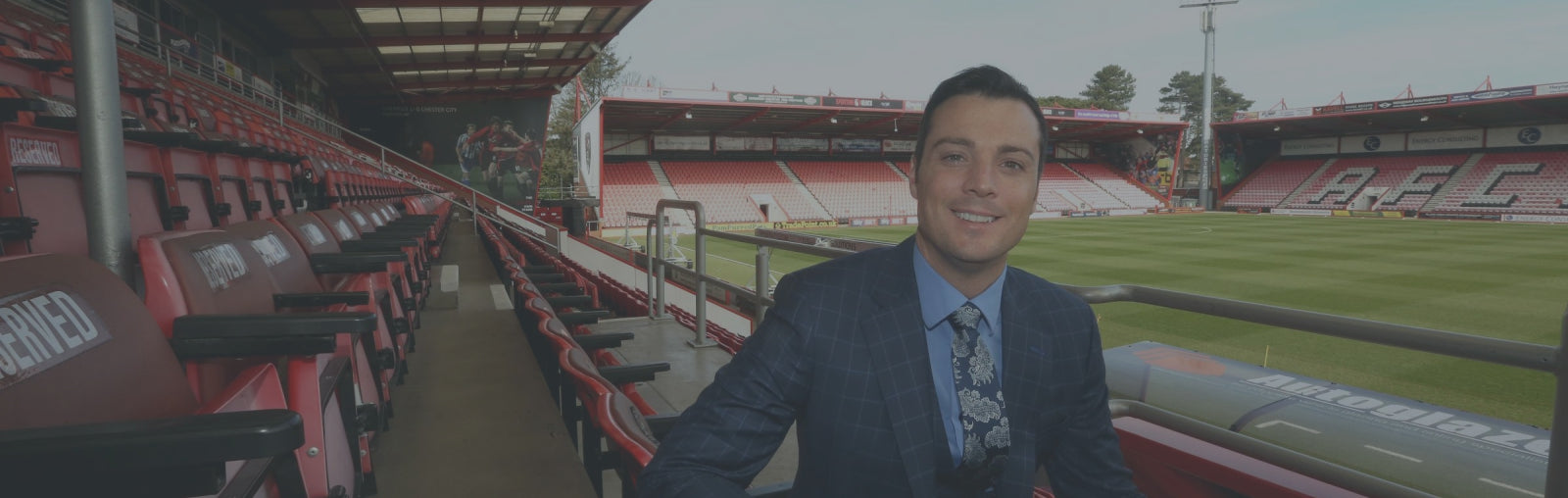 Rob Mitchell, commercial director of AFC bournemouth at Vitality Stadium with testimonial for footballkitsdirect.com
