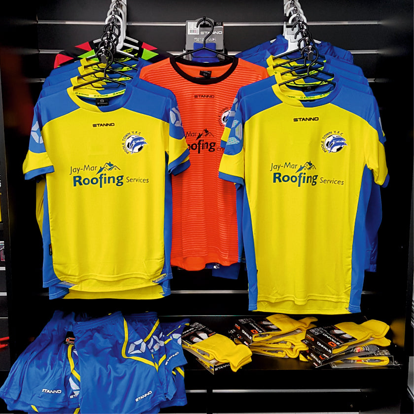Club shop image of Poole Town Youth football kit with yellow Stanno shirts on hangers within the Footballkitsdirect.com showroom. Image links to club shops page.